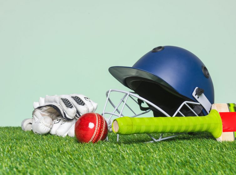 cricket-equipment-on-grass-VLJKMF3